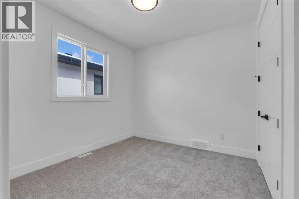 223 Kinniburgh Loop, Chestermere, Alberta  T1X 2S7 - Photo 36 - A2279252