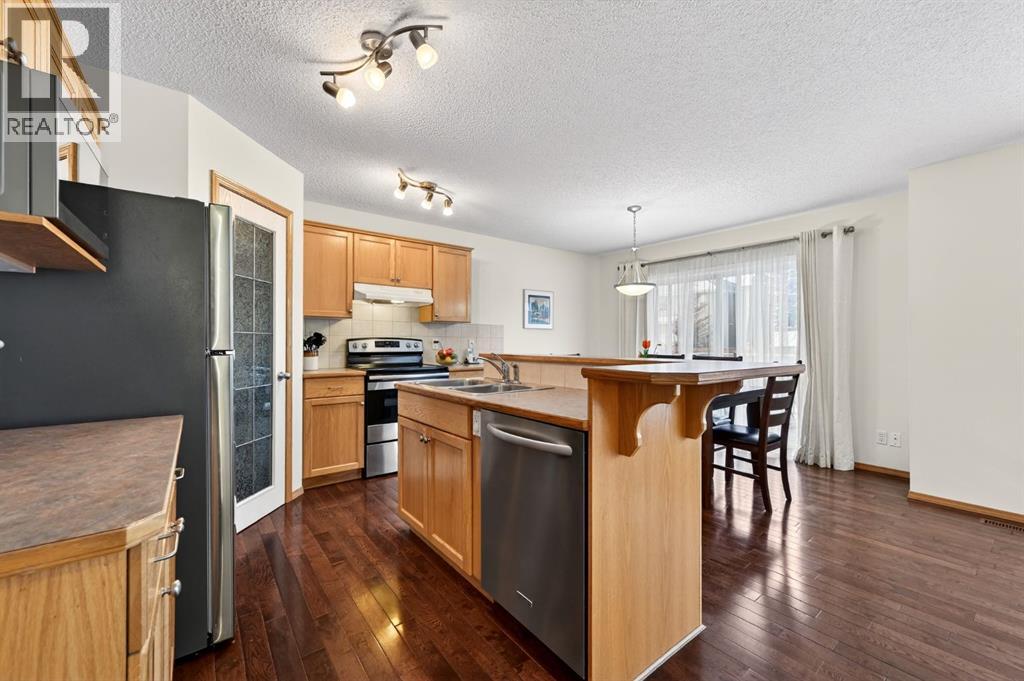 59 Cougar Ridge Circle Sw, Calgary, Alberta  T3H 5C8 - Photo 9 - A2277342