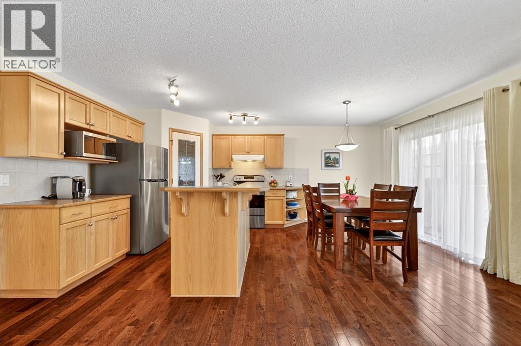 59 Cougar Ridge Circle Sw, Calgary, Alberta  T3H 5C8 - Photo 7 - A2277342