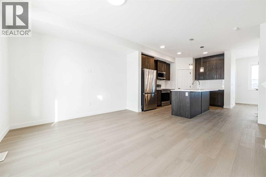 1921 Mccaskill Drive, Crossfield, Alberta  T0M 0S0 - Photo 3 - A2278527