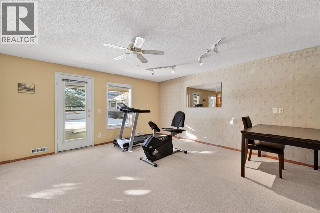 206 Arbour Cliff Close Nw, Calgary, Alberta  T3G 3W7 - Photo 21 - A2278123