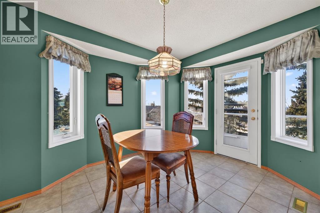 206 Arbour Cliff Close Nw, Calgary, Alberta  T3G 3W7 - Photo 12 - A2278123