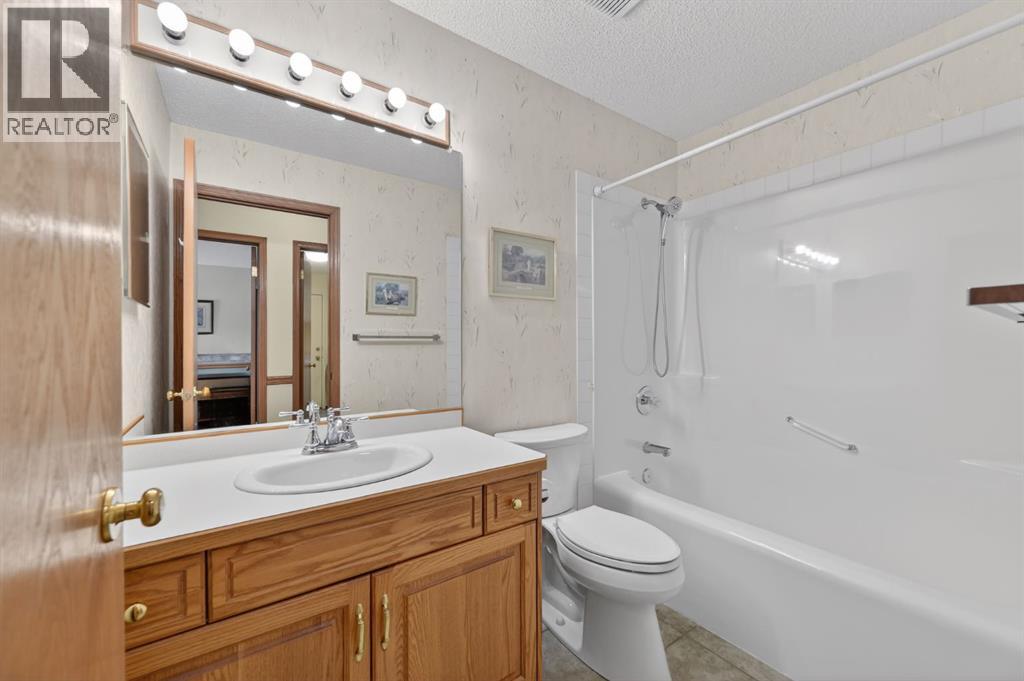 206 Arbour Cliff Close Nw, Calgary, Alberta  T3G 3W7 - Photo 18 - A2278123