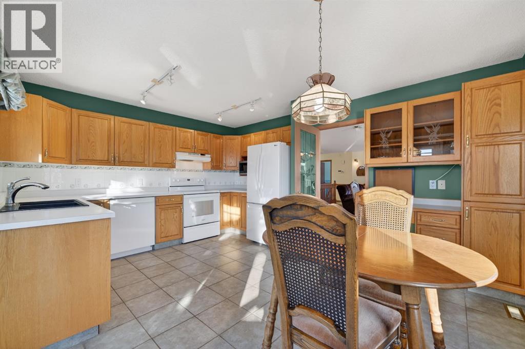 206 Arbour Cliff Close Nw, Calgary, Alberta  T3G 3W7 - Photo 10 - A2278123