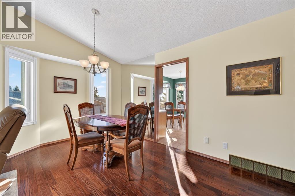 206 Arbour Cliff Close Nw, Calgary, Alberta  T3G 3W7 - Photo 6 - A2278123