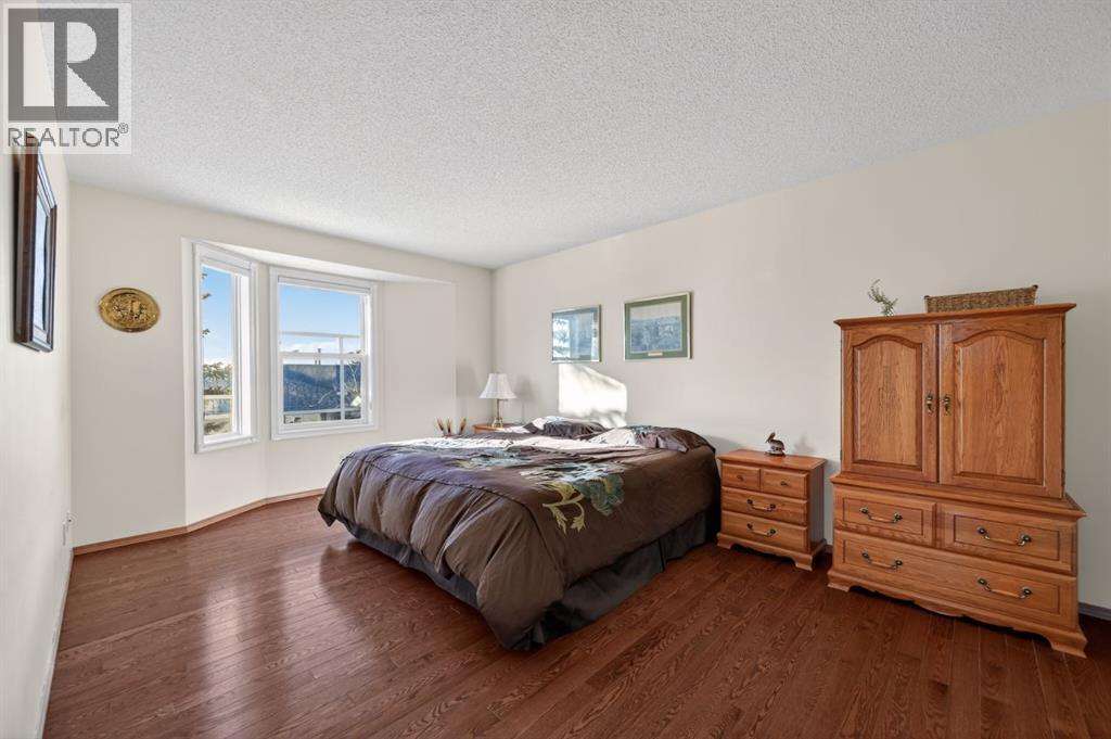 206 Arbour Cliff Close Nw, Calgary, Alberta  T3G 3W7 - Photo 14 - A2278123