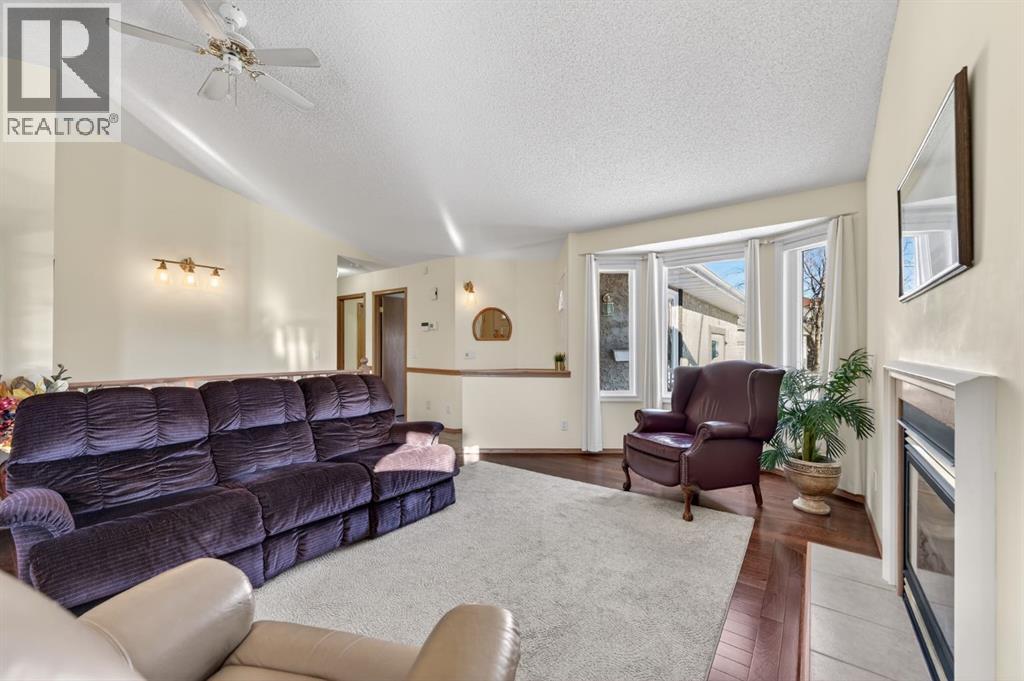 206 Arbour Cliff Close Nw, Calgary, Alberta  T3G 3W7 - Photo 3 - A2278123