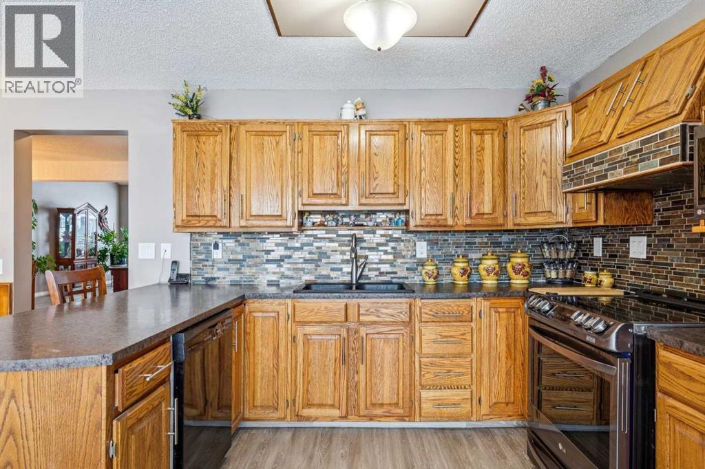 16 Bedwood Rise Ne, Calgary, Alberta  T2K 2T6 - Photo 6 - A2277584