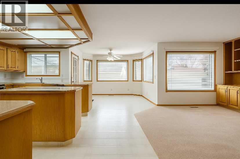 301 Riverview Green, Cochrane, Alberta  T4C 1K5 - Photo 18 - A2267736