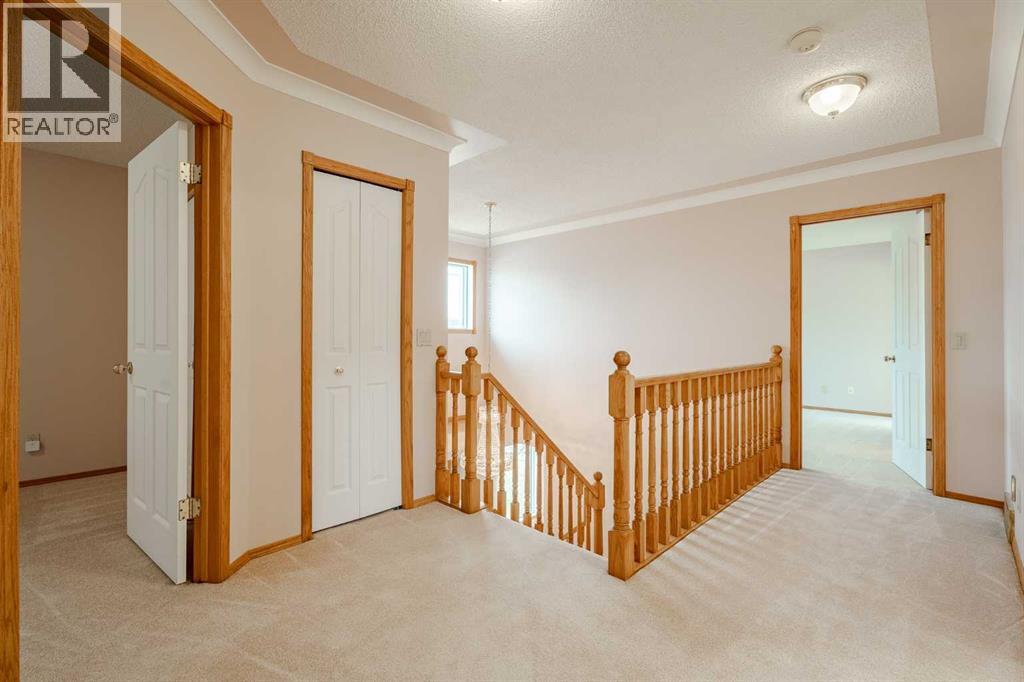 301 Riverview Green, Cochrane, Alberta  T4C 1K5 - Photo 32 - A2267736