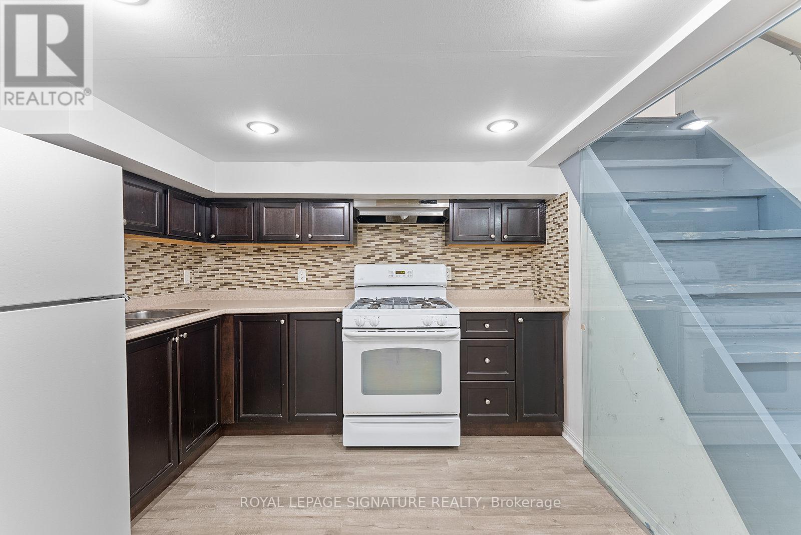 1 - 233 Greenwood Avenue, Toronto, Ontario  M4L 2R4 - Photo 8 - E12698102