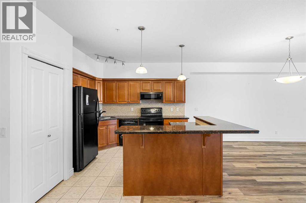 108, 11642 Valley Ridge Park Nw, Calgary, Alberta  T3B 5Z5 - Photo 9 - A2272977