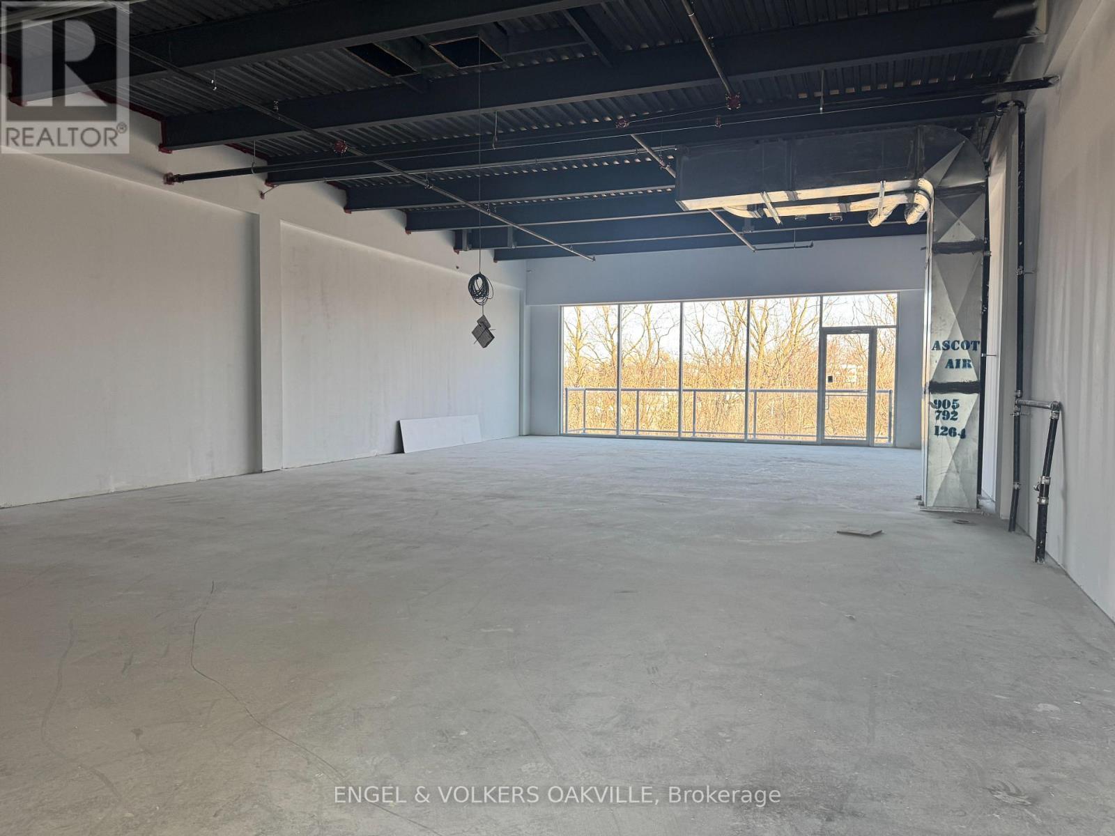 A208 - 1939 Ironoak Way, Oakville, Ontario  L6H 0N1 - Photo 11 - W12698366