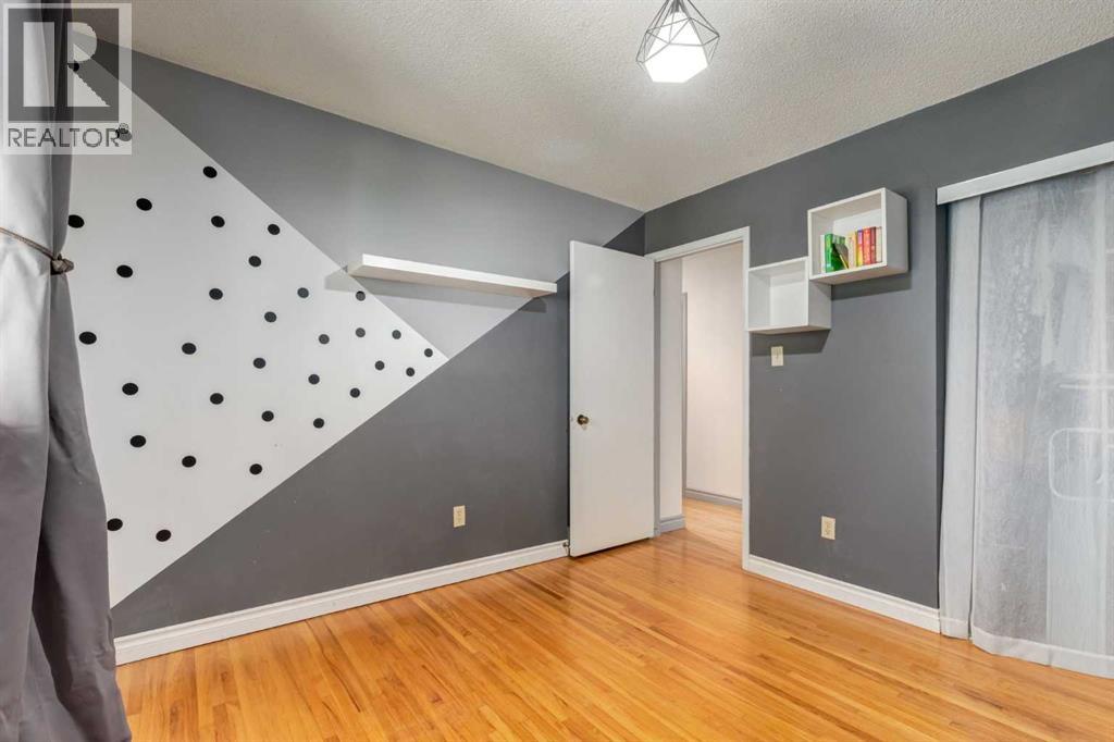 7103 Hunterwood Road Nw, Calgary, Alberta  T2K 4J5 - Photo 20 - A2275637