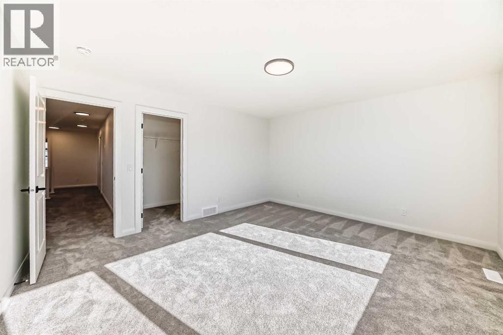 588 Grayling Bend, Rural Rocky View County, Alberta  T3Z 0H4 - Photo 29 - A2264134