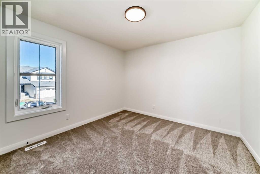 588 Grayling Bend, Rural Rocky View County, Alberta  T3Z 0H4 - Photo 33 - A2264134