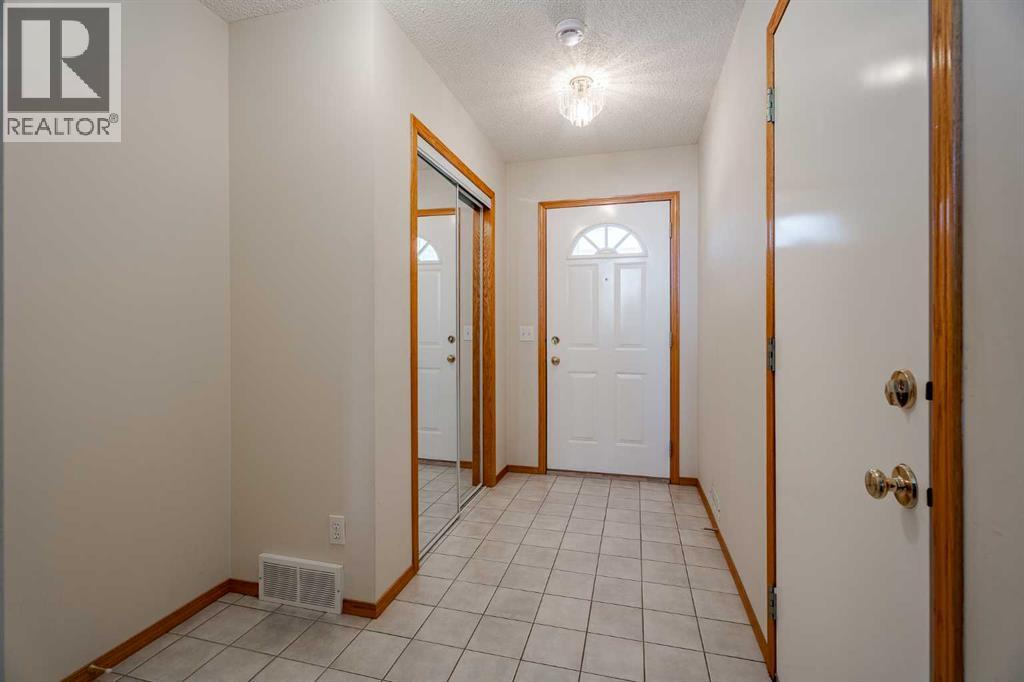 203 Anderson Grove Sw, Calgary, Alberta  T2W 6H7 - Photo 6 - A2277683