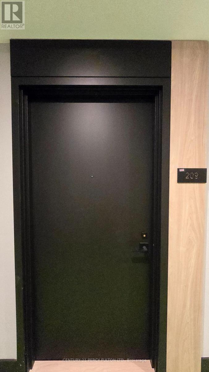 209 - 500 Plains Road E, Burlington, Ontario  L7T 0C8 - Photo 3 - W12698620