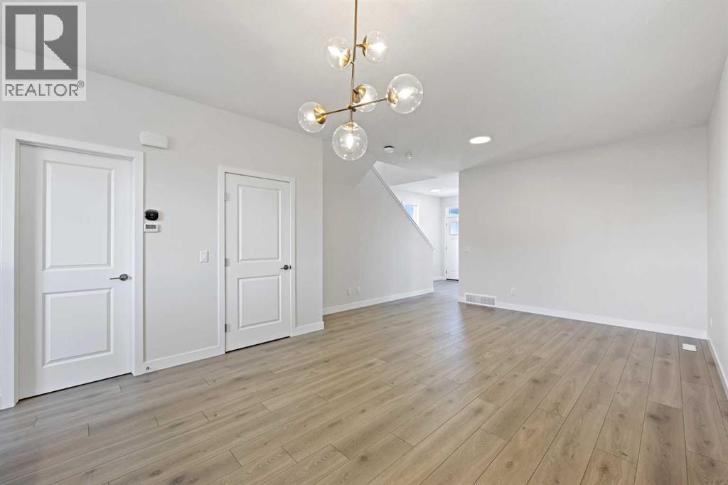 329 Ambleton Drive Nw, Calgary, Alberta  T3P 2B6 - Photo 5 - A2276697