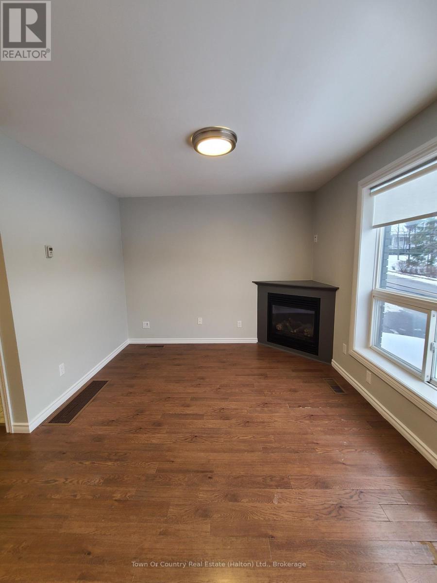 101 - 158 Mill Street, Milton, Ontario  L9T 1S2 - Photo 4 - W12699166