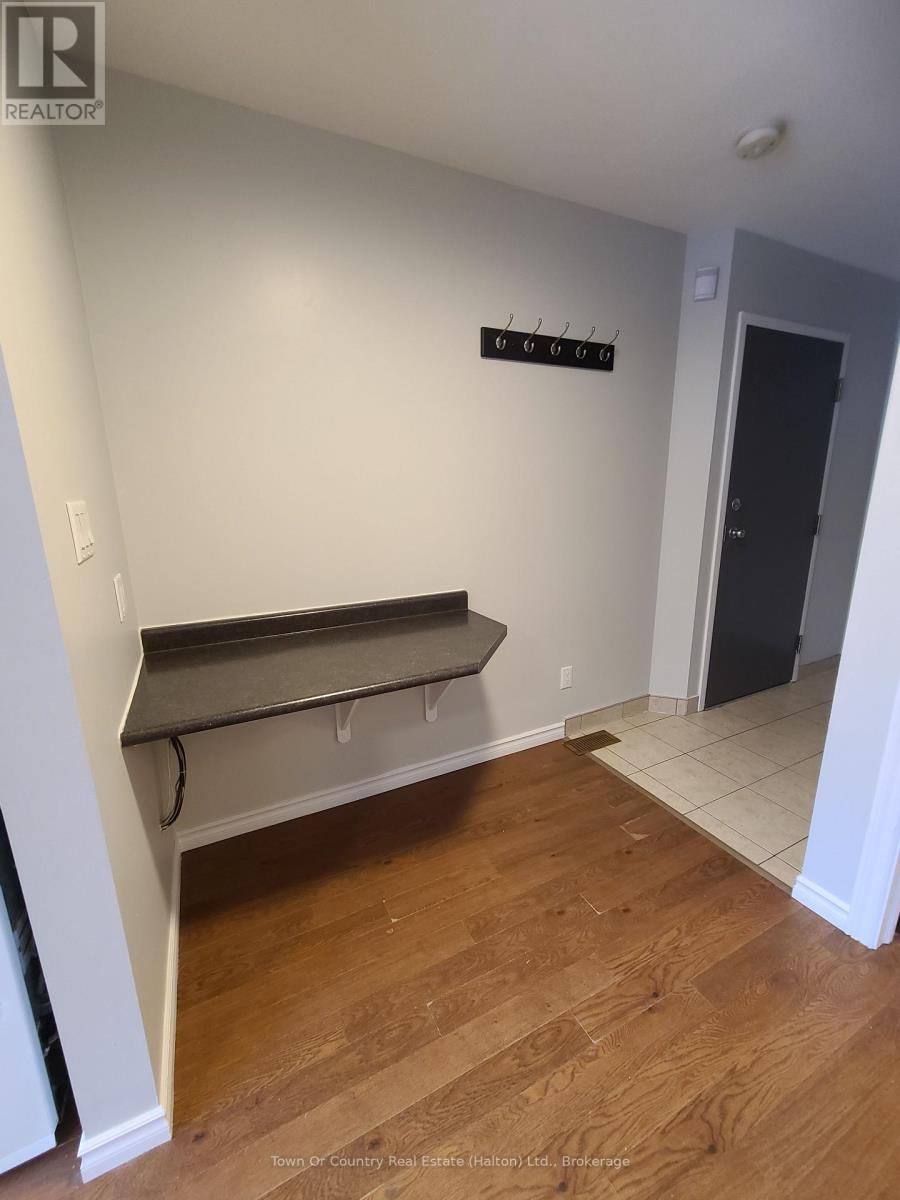 101 - 158 Mill Street, Milton, Ontario  L9T 1S2 - Photo 3 - W12699166