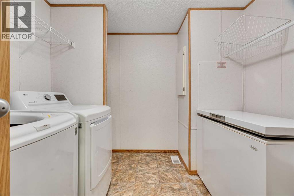 413 Heritage Crescent, Okotoks, Alberta  T1S 1P2 - Photo 29 - A2276756