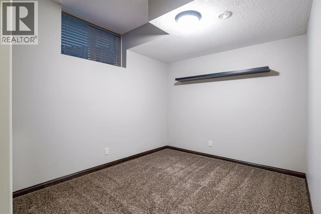 203 Sunset Circle, Cochrane, Alberta  T4C 0C8 - Photo 37 - A2277554