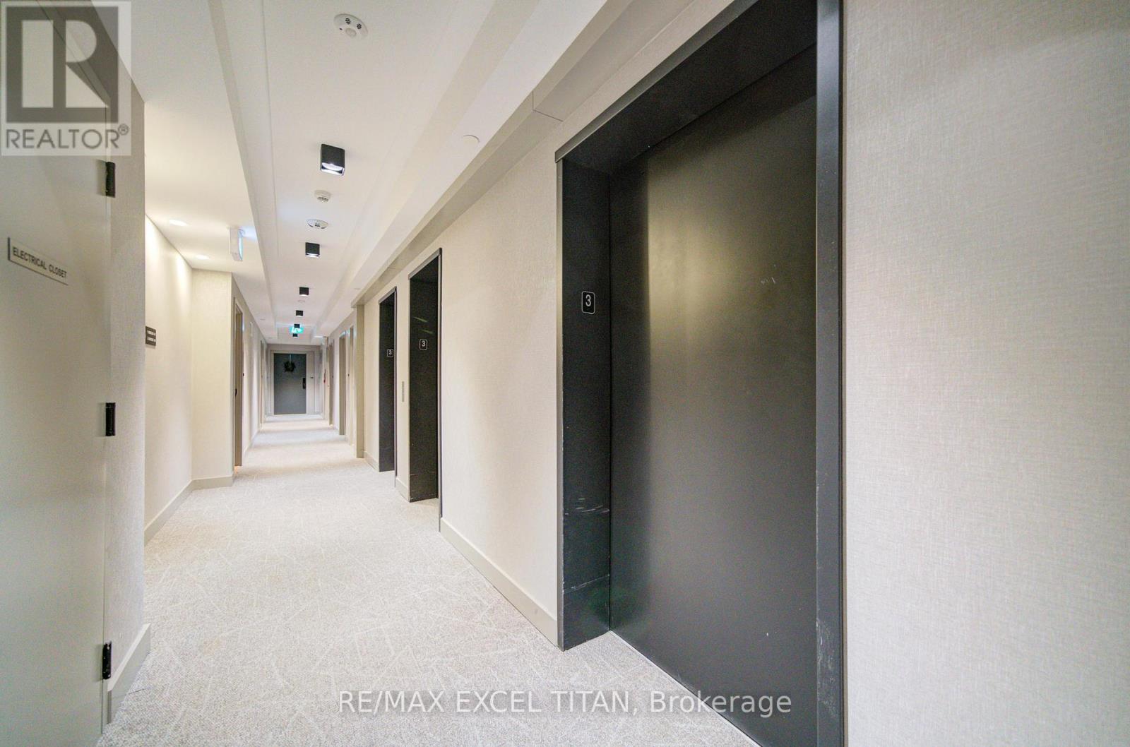 303 - 335 Wheat Boom Drive, Oakville, Ontario  L6H 7C2 - Photo 3 - W12699430