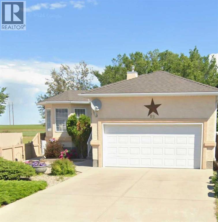 Immaculate raised bungalow with main-floor laundry and a bright, inviting atmosphere. This custom-built Soroka Homes property showcases exceptional care and thoughtful design throughout. Four bedrooms plus a flex room. Clean finishes, and well-chosen fixtures create a modern, cohesive look.  Updated flooriing including vinyl plank and carpet.  Hot water tank is 1 year old.  The low-maintenance front yard and fully fenced backyard (57 ft wide) back onto green space with a nearby playground and side onto a walkway. The 18 x 21 ft attached garage is drywalled and insulated (ceiling not insulated) and includes a convenient side man door. The fully developed lower level offers excellent natural light, a cozy fireplace with fan and thermostat control, a versatile flex space (part of family room measurement) that could be converted to an additional bedroom. (id:48254)