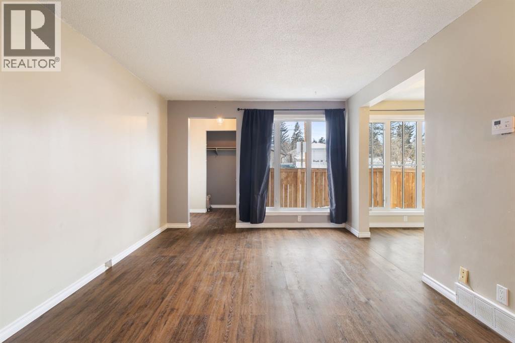 6, 6147 Buckthorn Road Nw, Calgary, Alberta  T2K 2Z2 - Photo 5 - A2278314