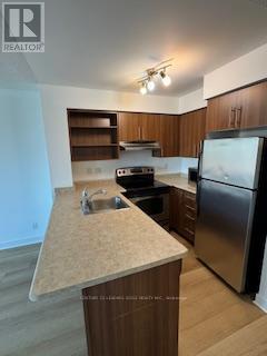 426 - 120 Dallimore Circle, Toronto, Ontario  M3C 4J1 - Photo 9 - C12699598
