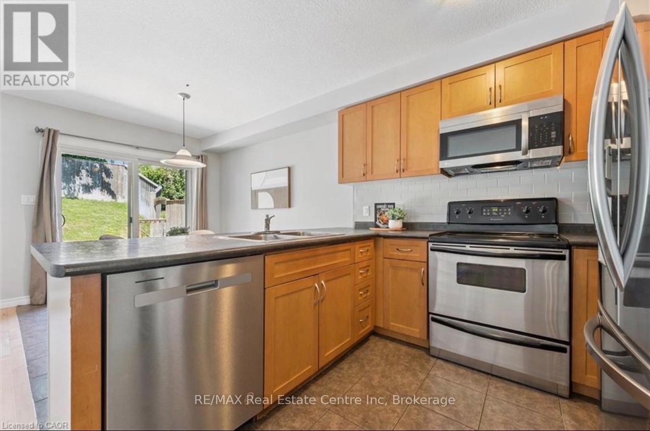 158 Kemp Crescent, Guelph, Ontario  N1E 0K1 - Photo 3 - X12699870