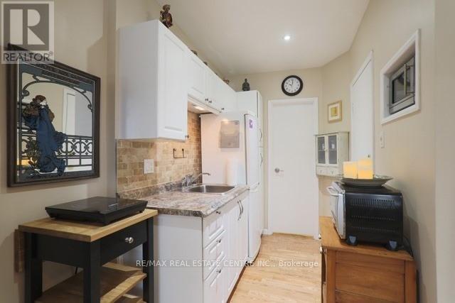 Main Level Studio - 1 Hiawatha Road, Toronto, Ontario  M4L 2X7 - Photo 3 - E12699792