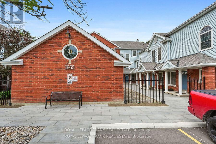 Welcome to Parkwood Village a hidden gem in a prime location! This dreamy 1,455 sq ft condo checks all the boxes. From the moment you walk in, you'll feel the warmth and sophistication of this beautifully updated space. The layout is spacious and bright, featuring a welcoming living and dining area with a cozy electric fireplace and a walkout to your own private patio, perfect for your morning coffee or a quiet evening to unwind. The kitchen is a standout with stainless steel appliances, a generous eat-in area, and a walk-in pantry (yes, a pantry!). The primary bedroom feels like a true retreat with double closets and a renovated ensuite. You will also find two more large bedrooms with great closet space, a second updated bathroom, and convenient in-suite laundry. It is bungalow-style living at its best, everything is on one level, so its easy and comfortable. No stairs, no shovelling snow, no cutting grass. Just lock the door and go whenever you please. Whether you are upsizing, downsizing, or right-sizing, this condo offers the space, style, and freedom you have been looking for. Come and see it ! You fall in love! (id:48254)