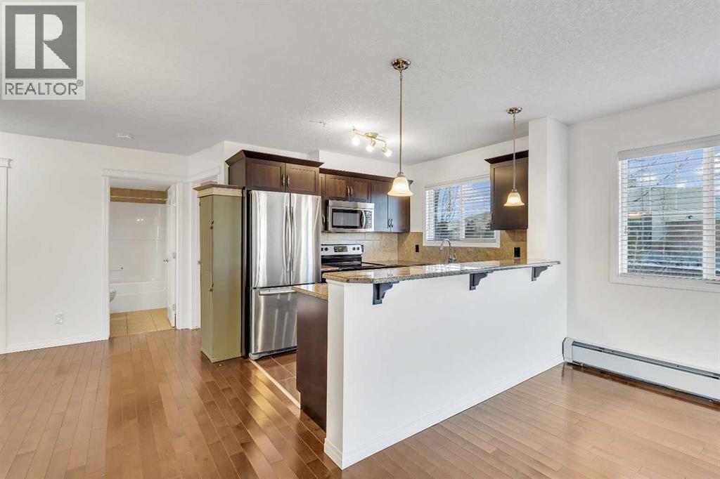 1202, 175 Panatella Hill Nw, Calgary, Alberta  T3K 0V9 - Photo 6 - A2279506