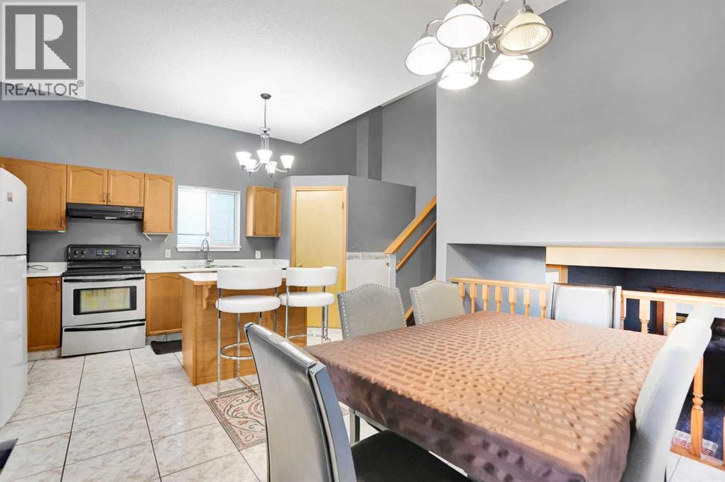 6934 Laguna Way Ne, Calgary, Alberta  T1Y 6W2 - Photo 8 - A2277480