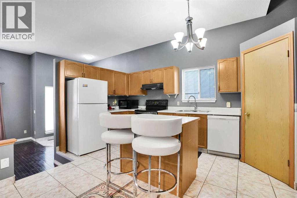 6934 Laguna Way Ne, Calgary, Alberta  T1Y 6W2 - Photo 9 - A2277480