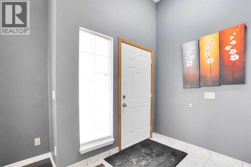 6934 Laguna Way Ne, Calgary, Alberta  T1Y 6W2 - Photo 4 - A2277480