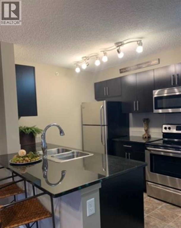 3416, 81 Legacy Boulevard Se, Calgary, Alberta  T2X 2B9 - Photo 7 - A2270865