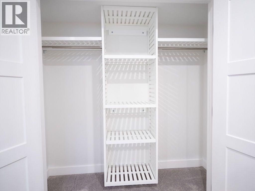 1349 Lake Sylvan Drive Se, Calgary, Alberta  T2J 3Z5 - Photo 36 - A2279137