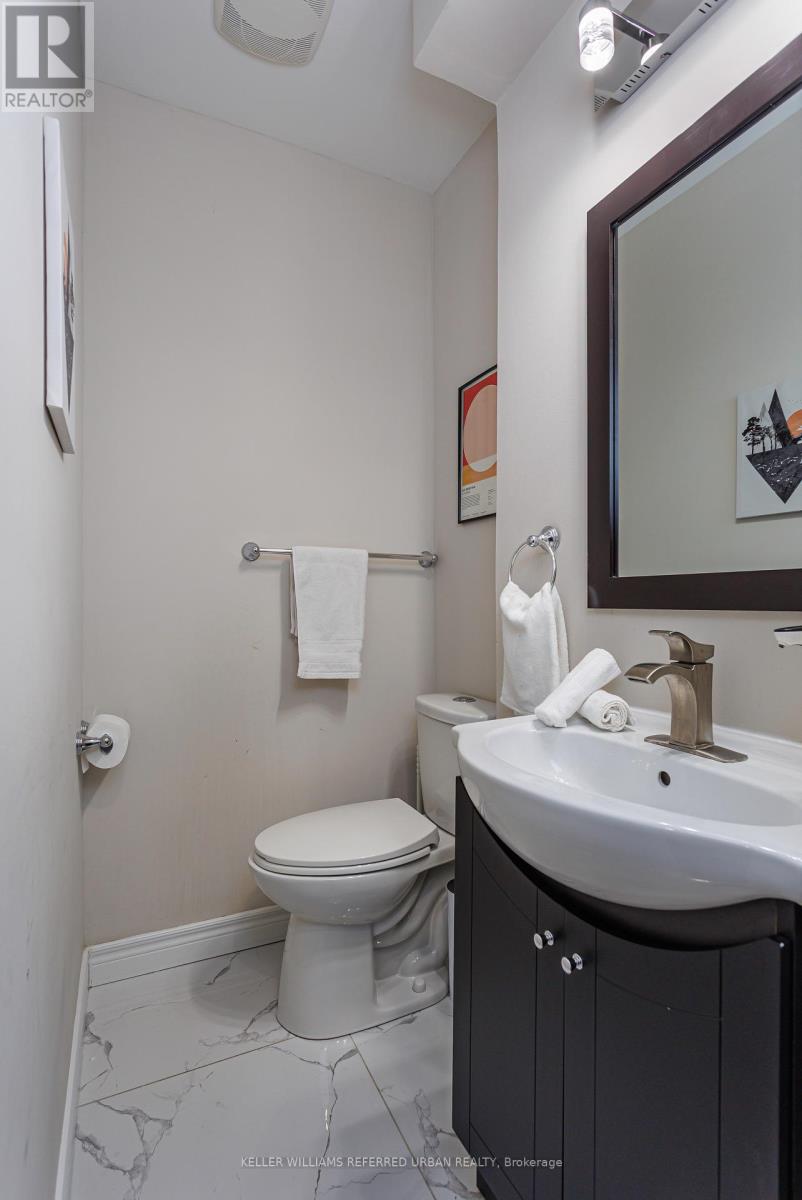 647 Rhodes Avenue, Toronto, Ontario  M4J 4X5 - Photo 6 - E12700480