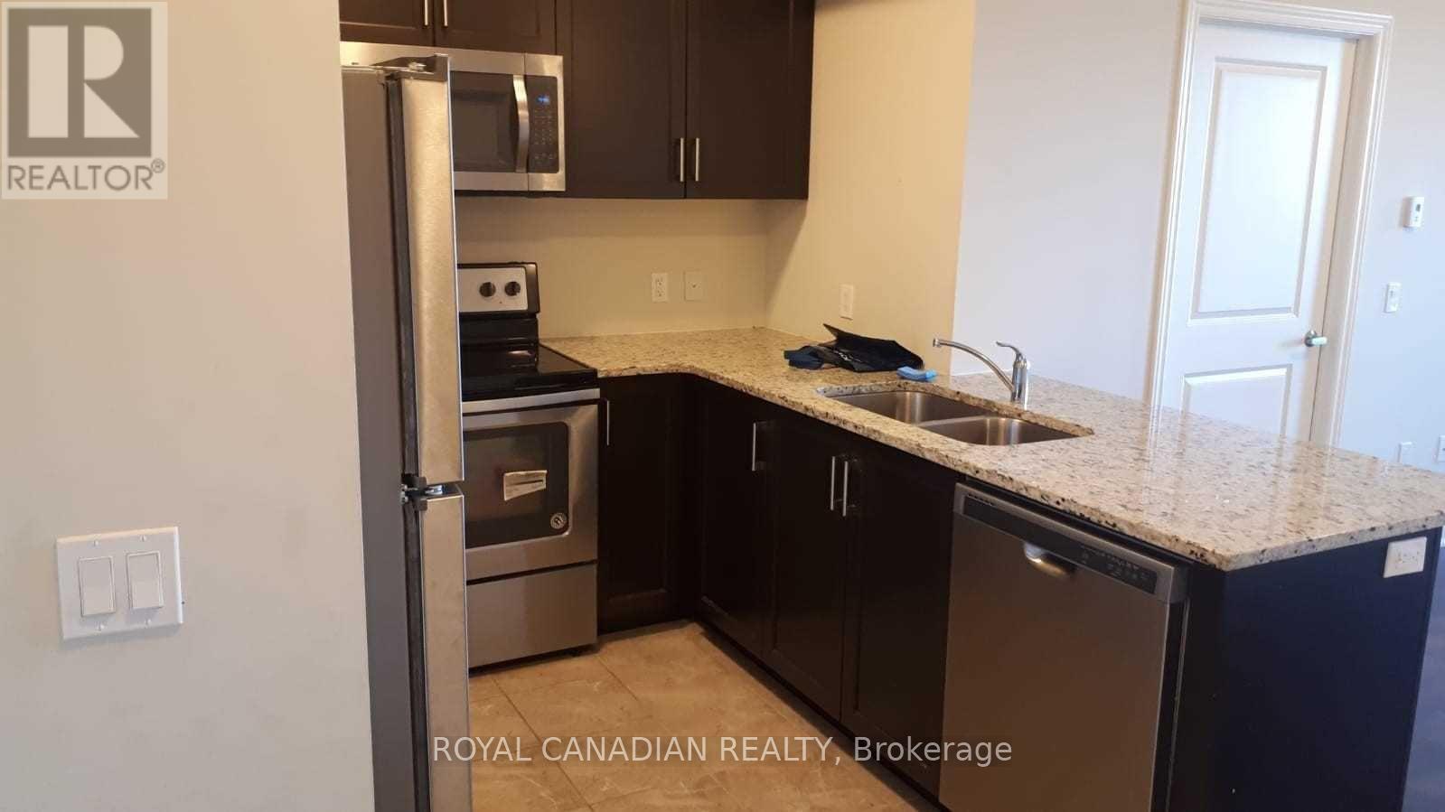 124 - 630 Sauve Street, Milton, Ontario  L9T 9A6 - Photo 8 - W12700472