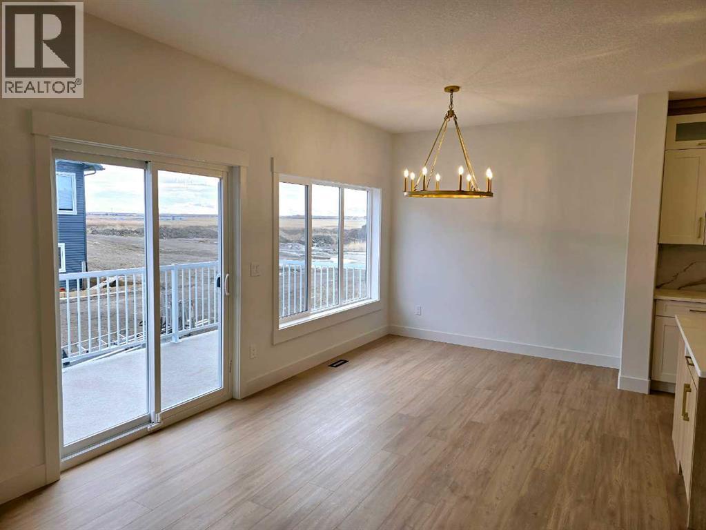 1350 Scarlett Ranch Boulevard, Carstairs, Alberta  T0M 0N0 - Photo 6 - A2245479