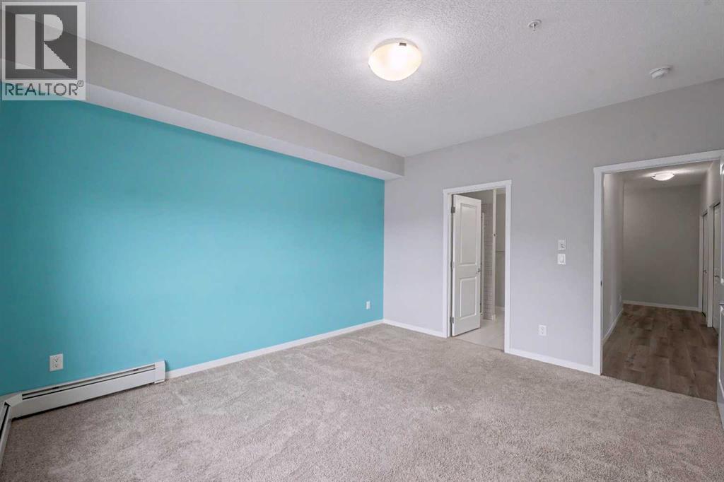 107, 360 Harvest Hills Common Ne, Calgary, Alberta  T3K 2N1 - Photo 15 - A2278636