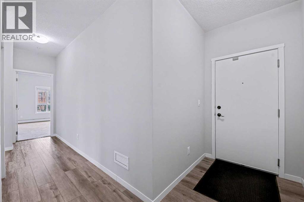 107, 360 Harvest Hills Common Ne, Calgary, Alberta  T3K 2N1 - Photo 10 - A2278636