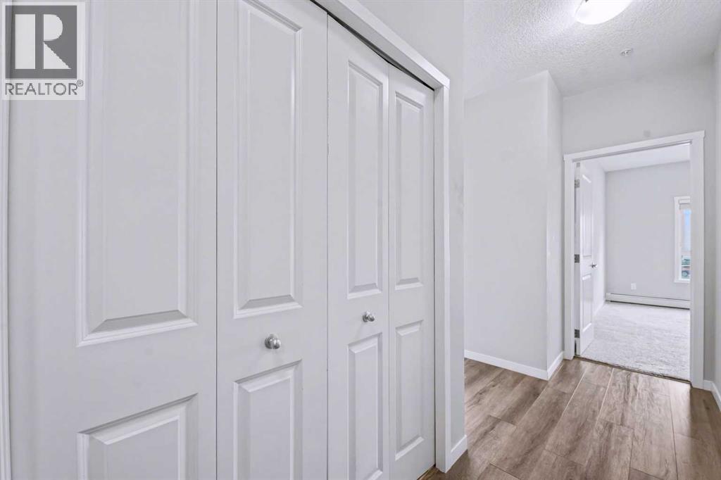 107, 360 Harvest Hills Common Ne, Calgary, Alberta  T3K 2N1 - Photo 11 - A2278636
