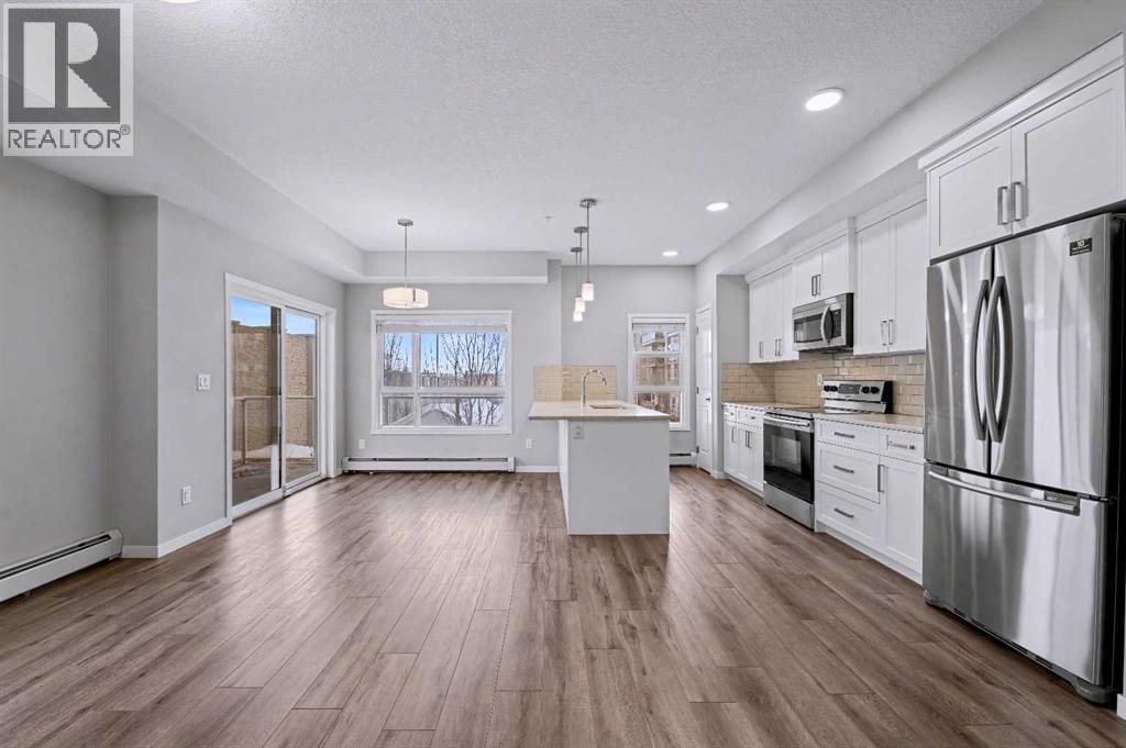 107, 360 Harvest Hills Common Ne, Calgary, Alberta  T3K 2N1 - Photo 31 - A2278636