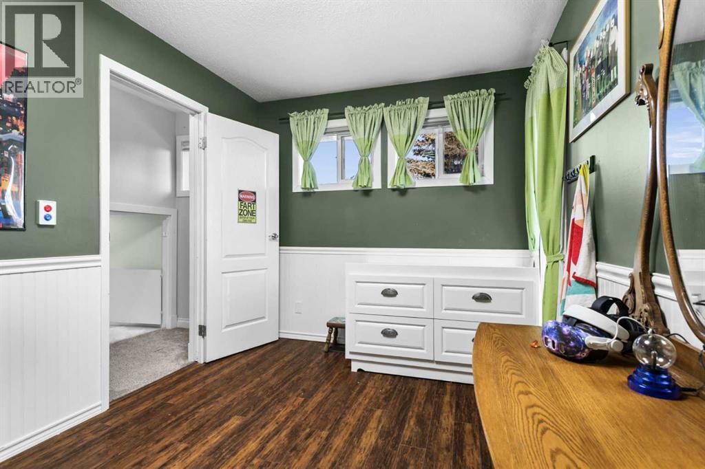 107 Woodford Crescent Sw, Calgary, Alberta  T2W 4C6 - Photo 24 - A2278674