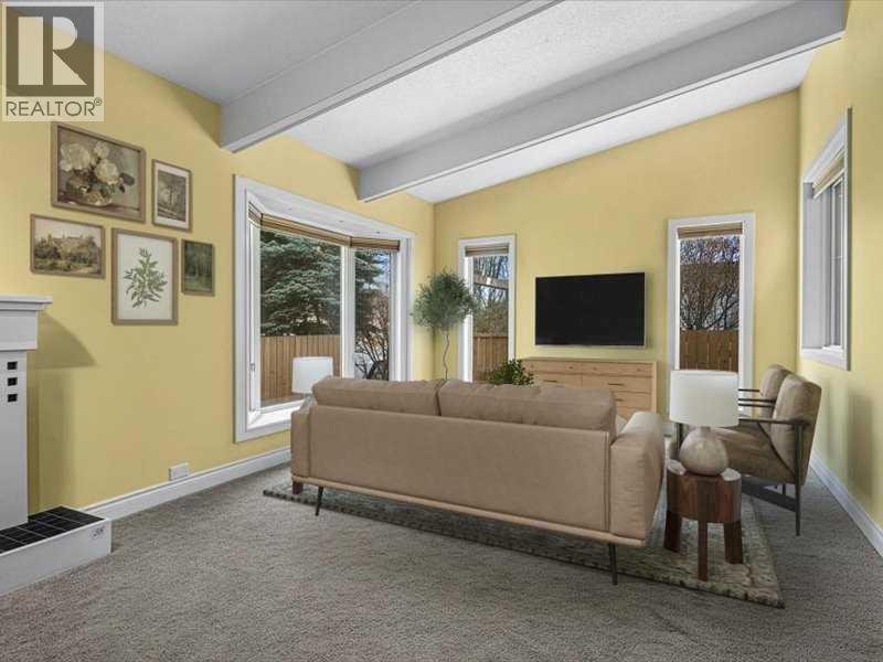 107 Woodford Crescent Sw, Calgary, Alberta  T2W 4C6 - Photo 8 - A2278674