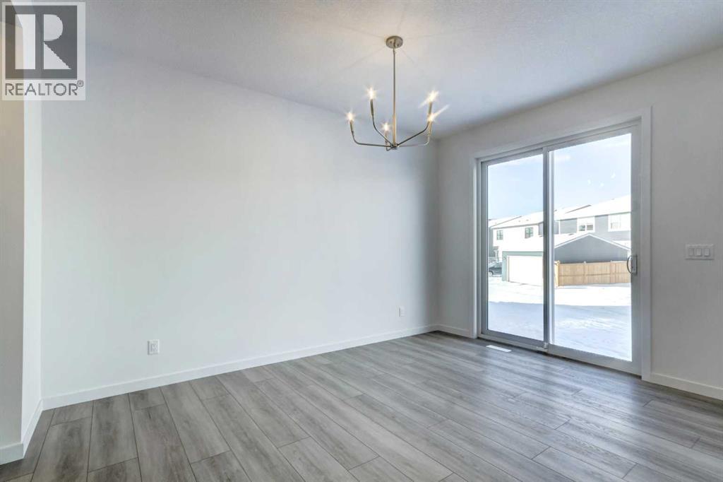 52 Magnolia Green Se, Calgary, Alberta  T3M 3X8 - Photo 6 - A2273468